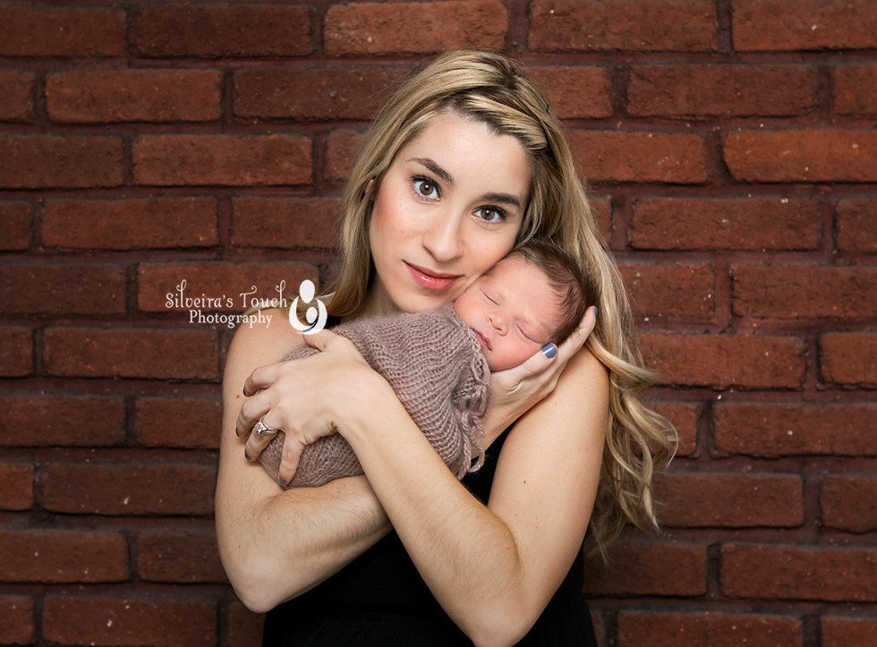 Mom holding newborn photography