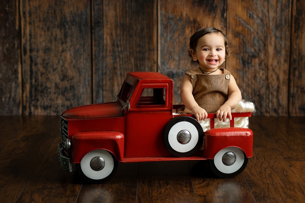 first birthday photographers NJ first birthday boy with red truck