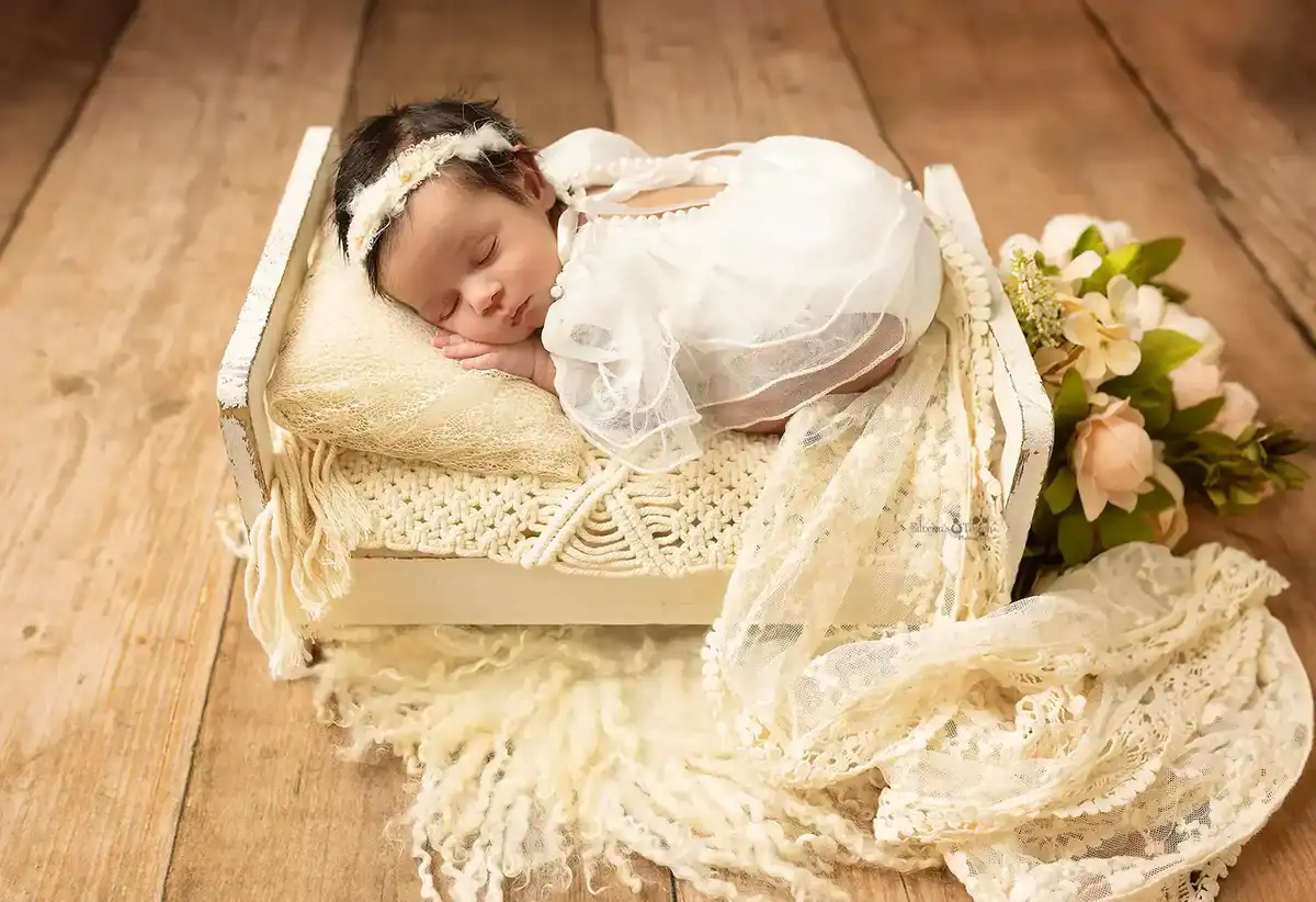 newborn girl on bed photographs newborn girl on bed photographs