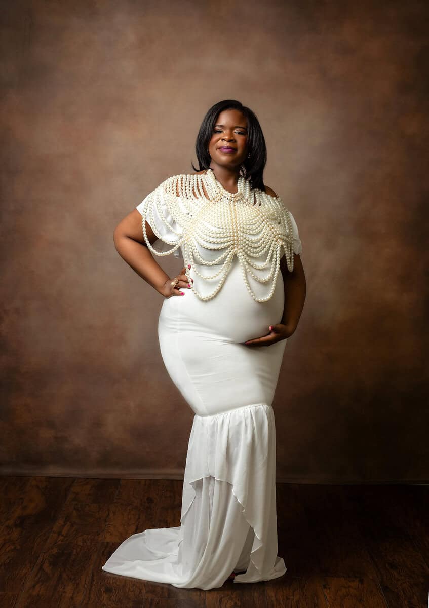 Studio maternity portraits randolph NJ maternity portraits taken in mount olive studio wearing a white gown and pearl necklace