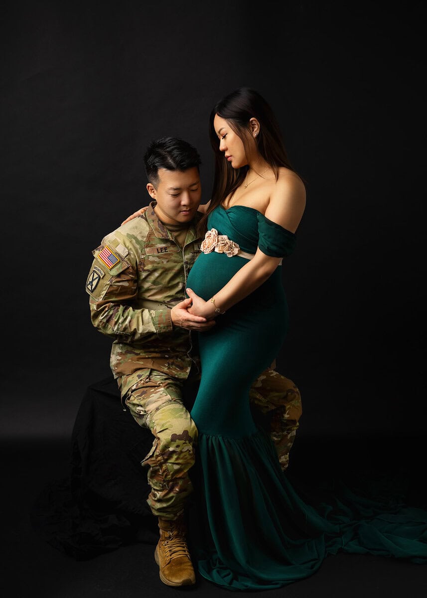 maternity photoshoot moment with expecting mom and dad sharing a loving connection