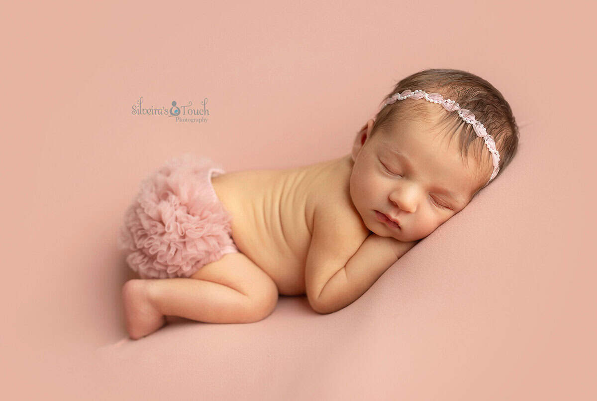 baby pictures on pink fabric