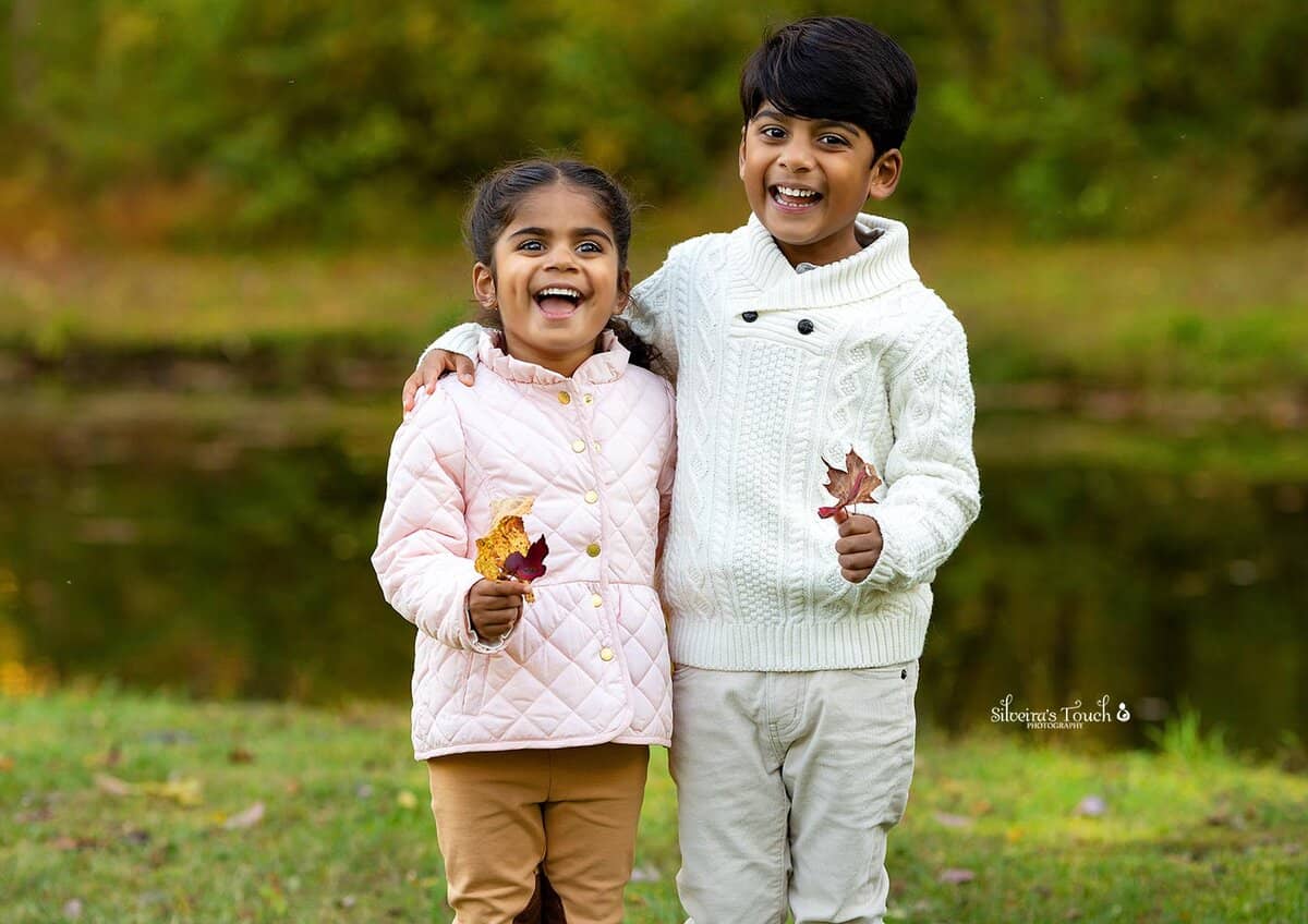 sibling fall photos outdoor in open field at Waterloo Village NJ
