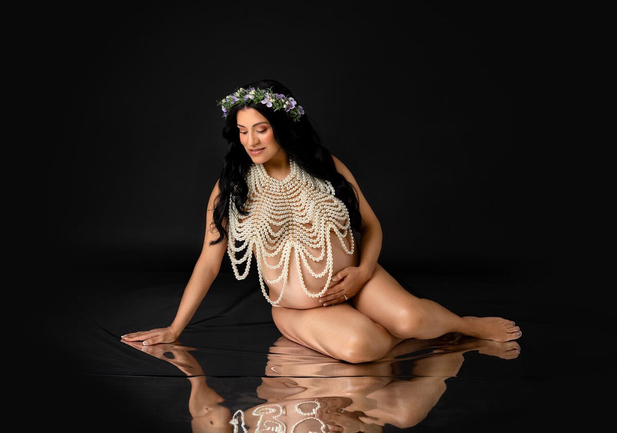 pregnancy photoshoot Mt Olive NJ Timeless maternity session wearing pearl accessory at Silveira's Touch Photography studio