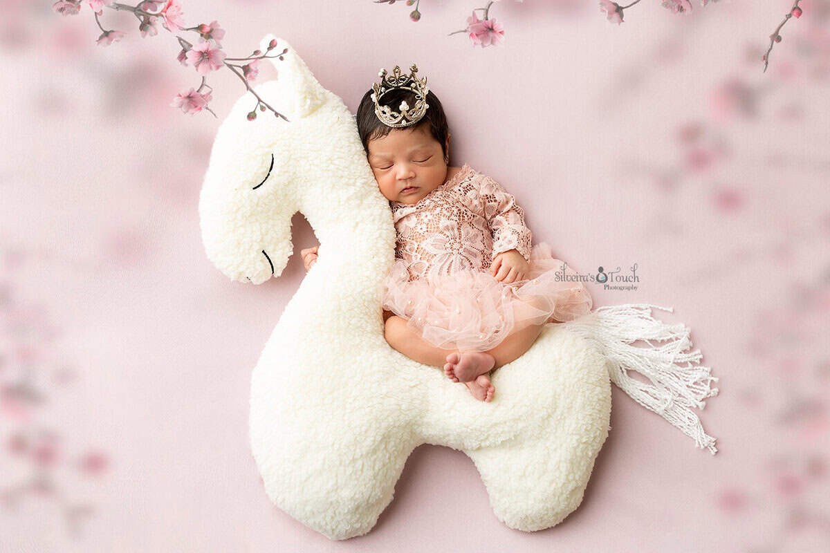 baby girl on pink photography